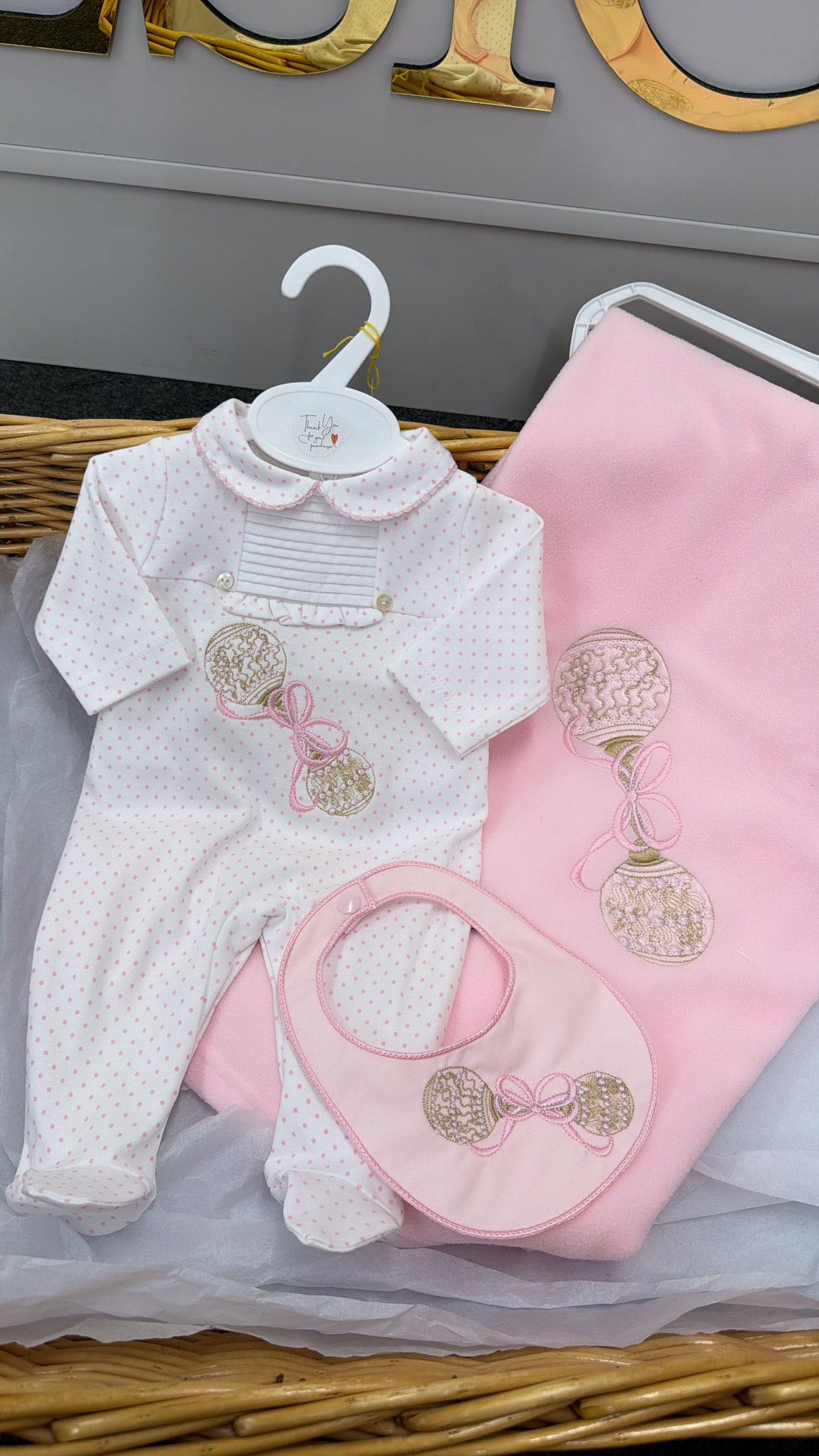 Pink rattle Babygrow and bib