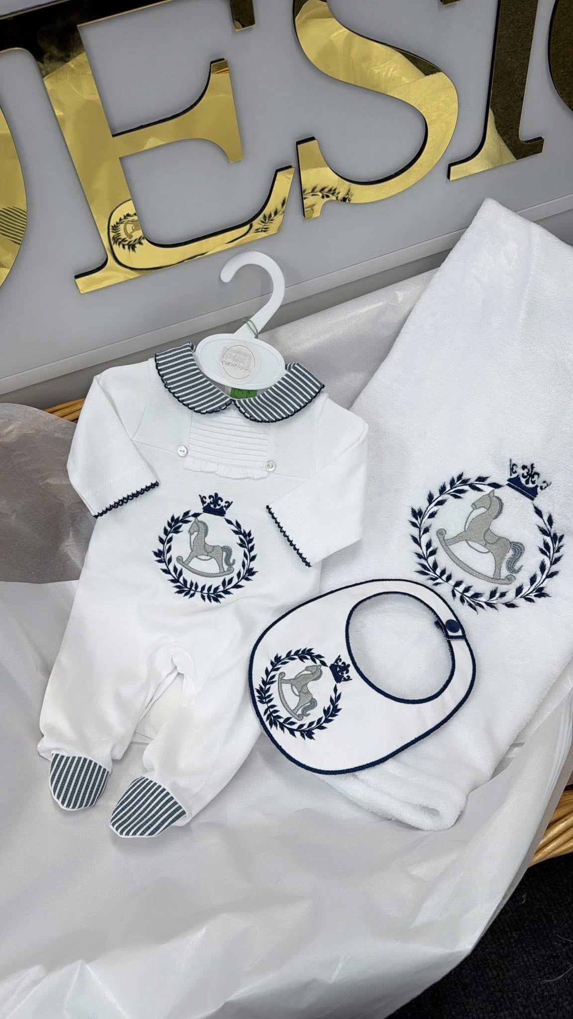 Navy & white babygrow and bib ( blanket sold separately)Rocking horse design