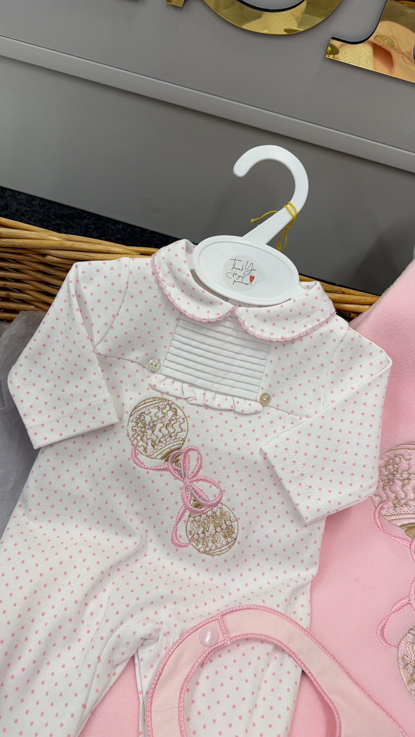 Pink rattle Babygrow and bib