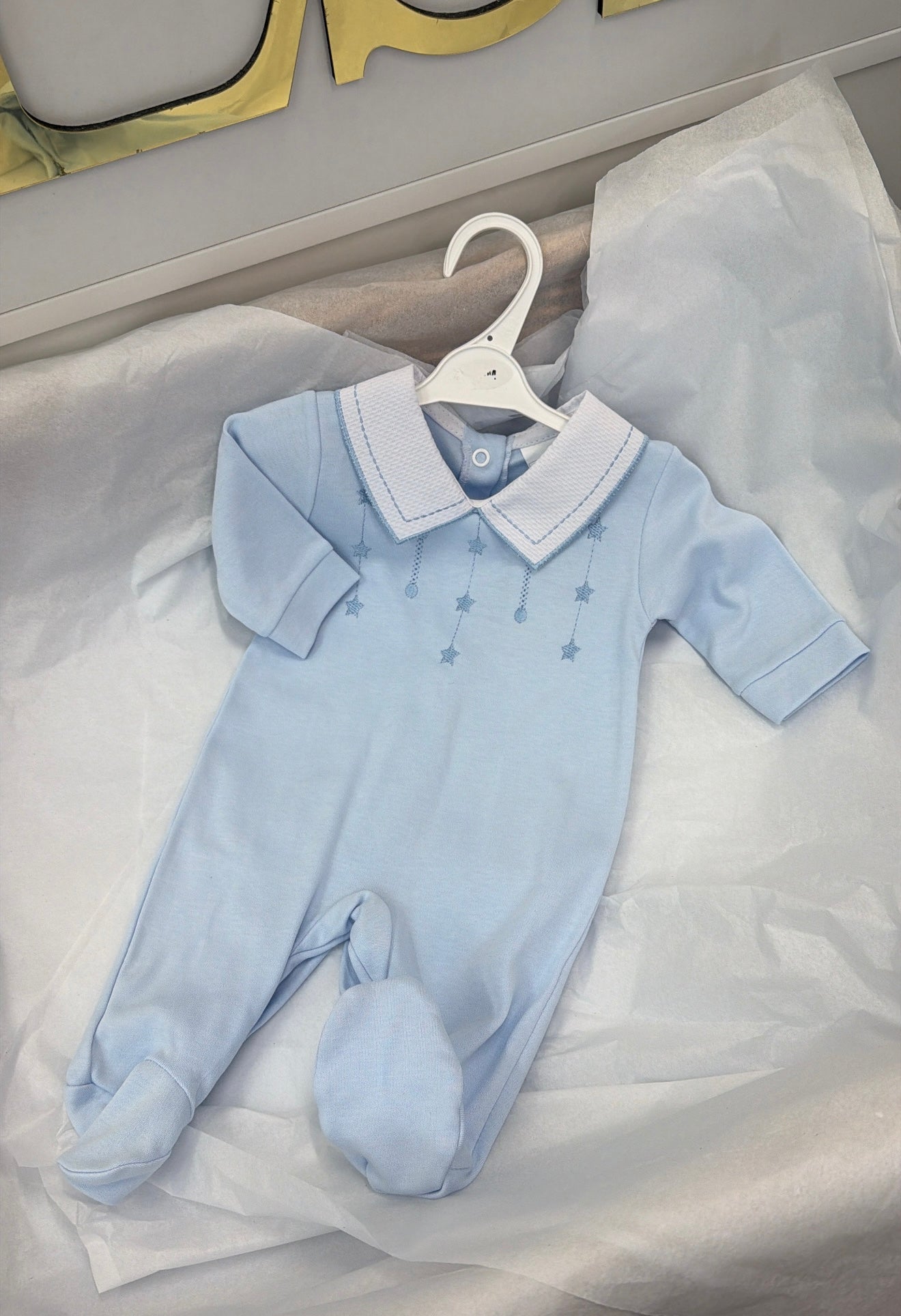 Baby blue star babygrow