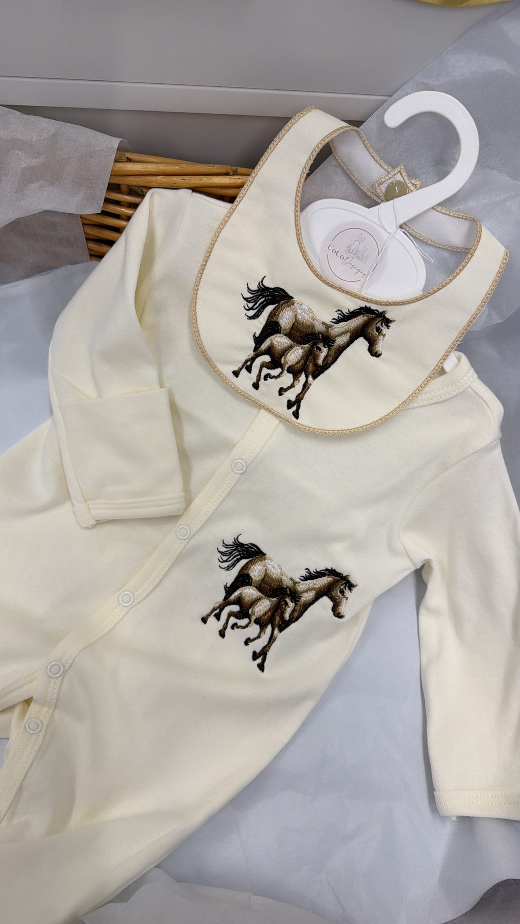 Horse babygrow and bib in cream