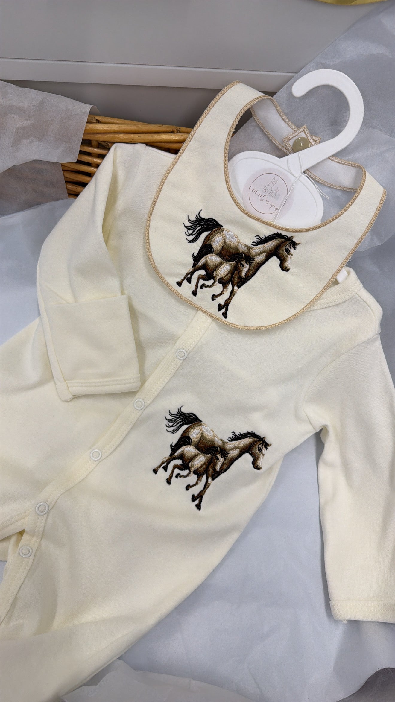 Horse babygrow and bib in cream