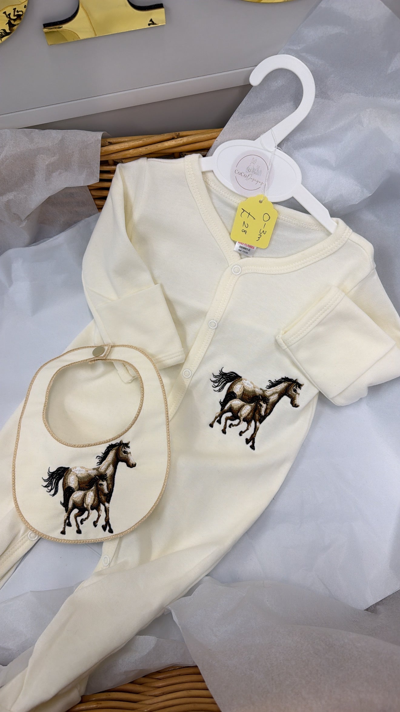 Horse babygrow and bib in cream