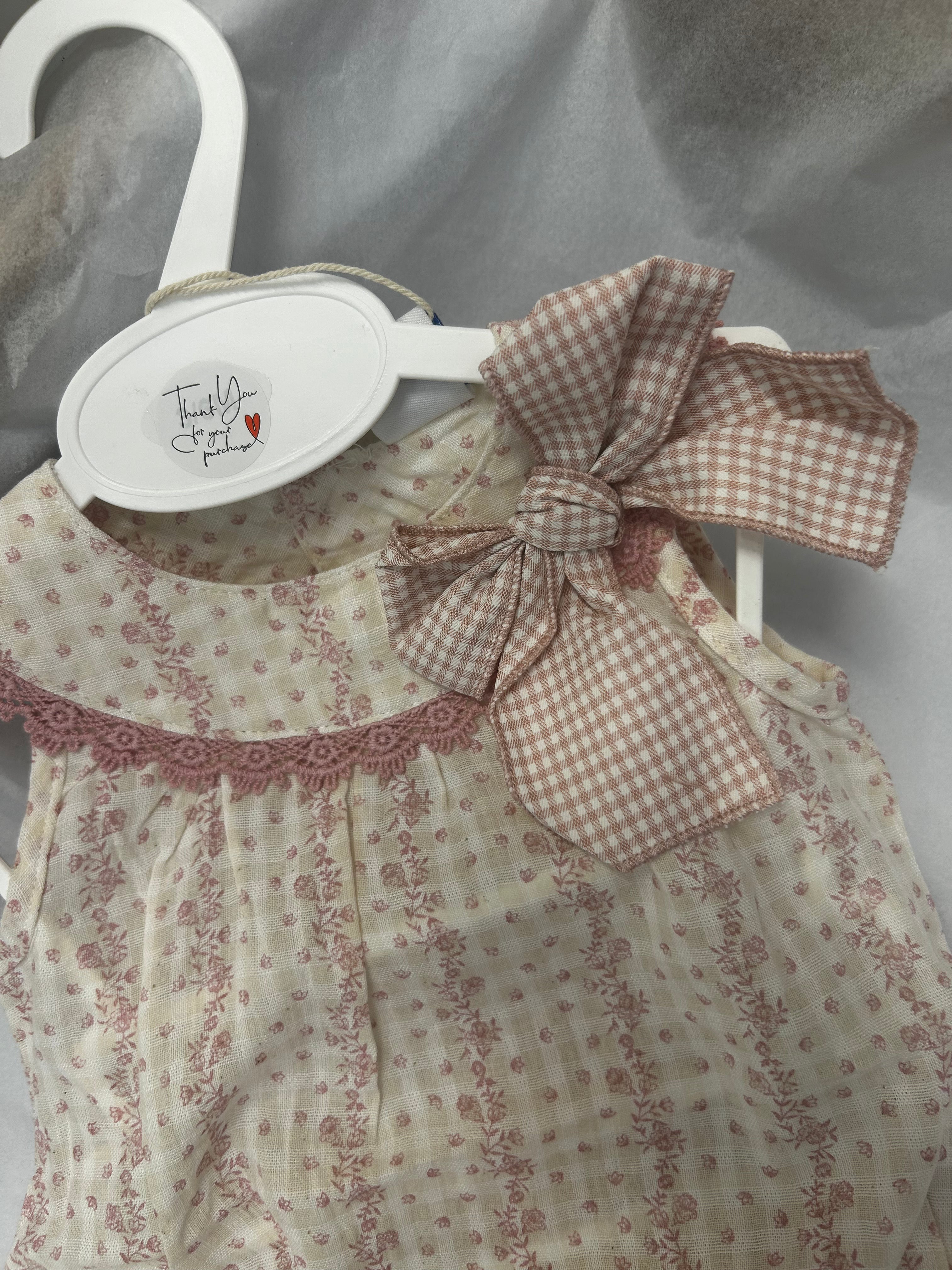 Dotty floral romper with check bow