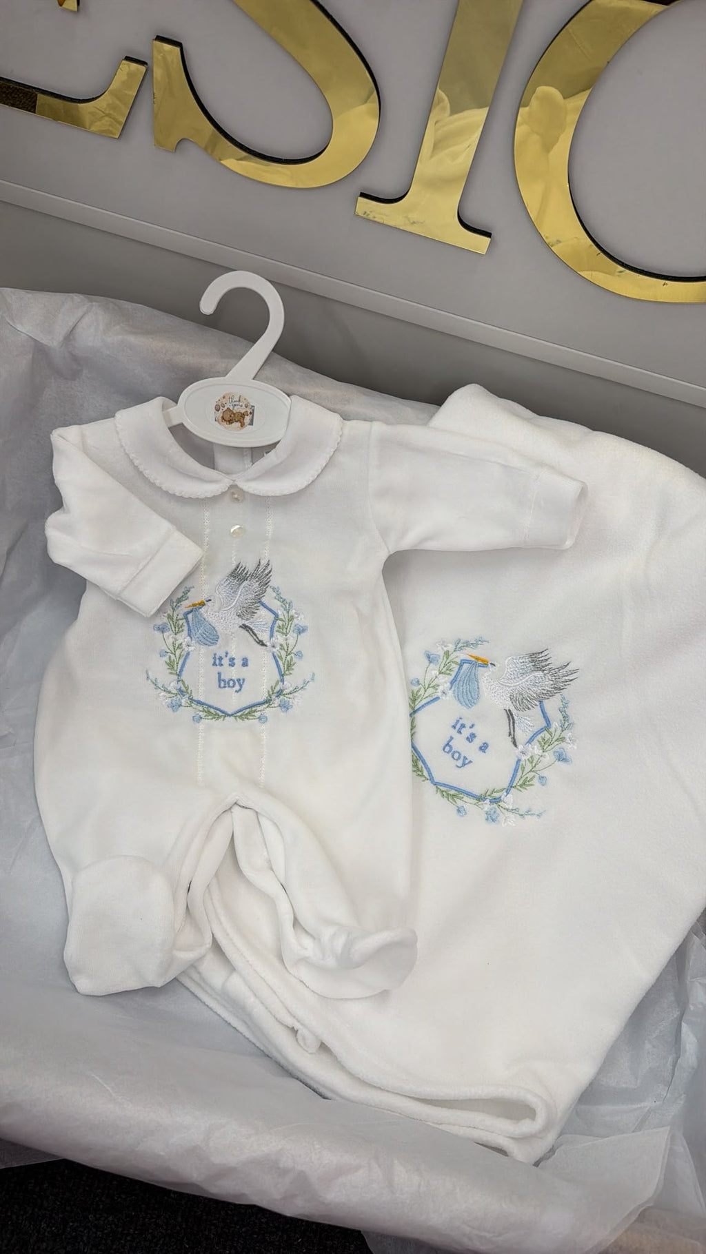 It’s a boy babygrow and blanket