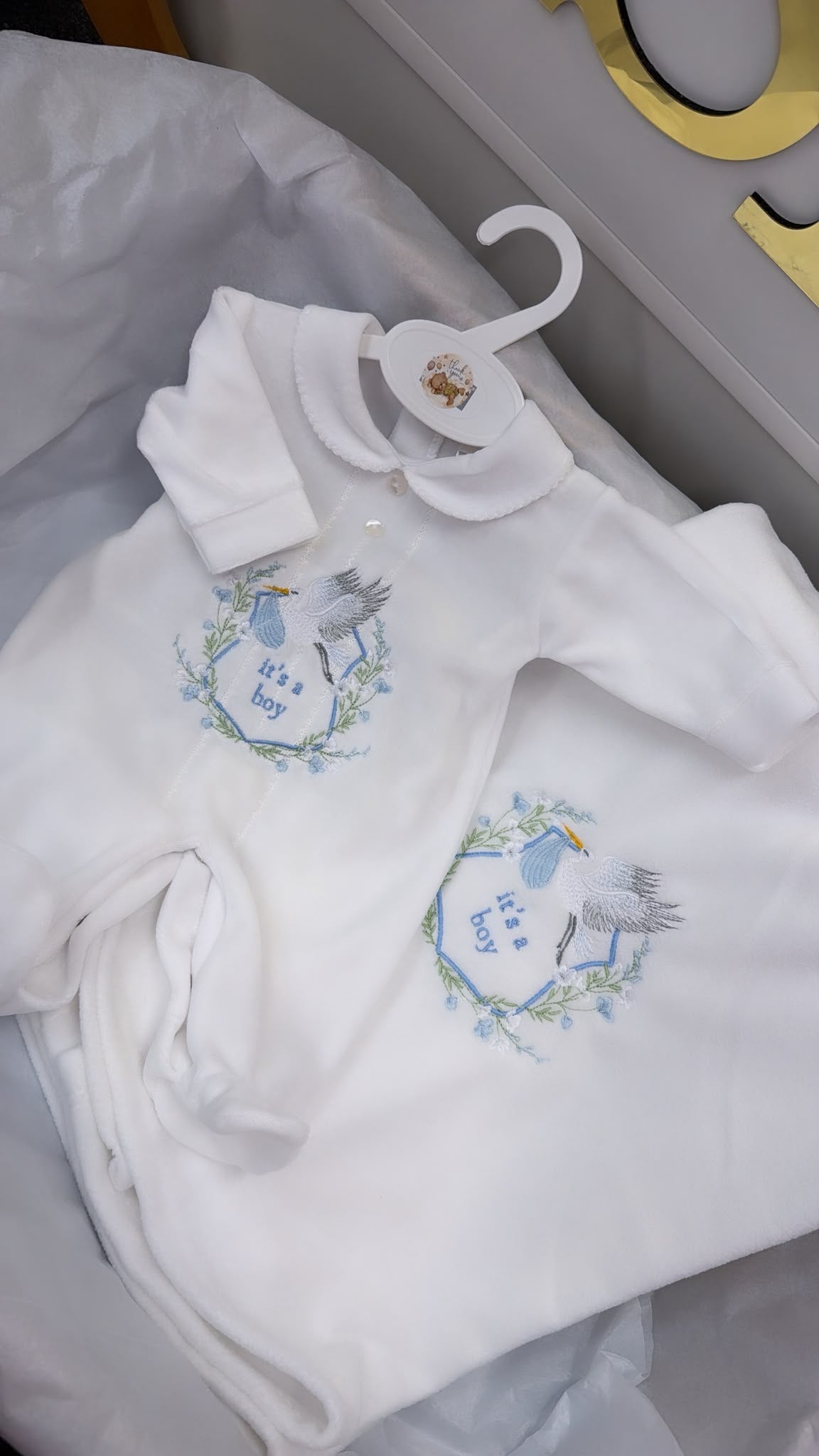 It’s a boy babygrow and blanket