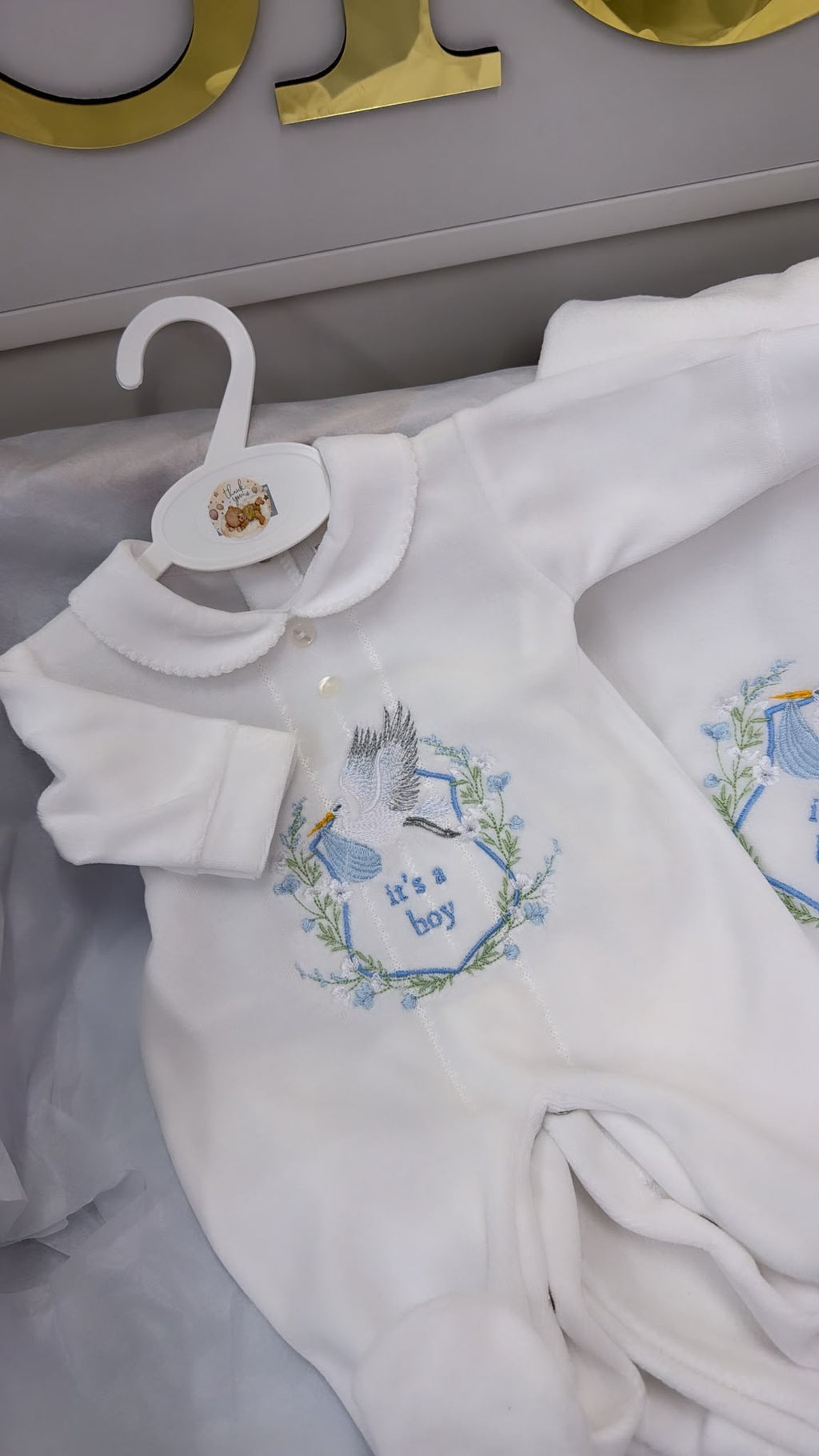 It’s a boy babygrow and blanket