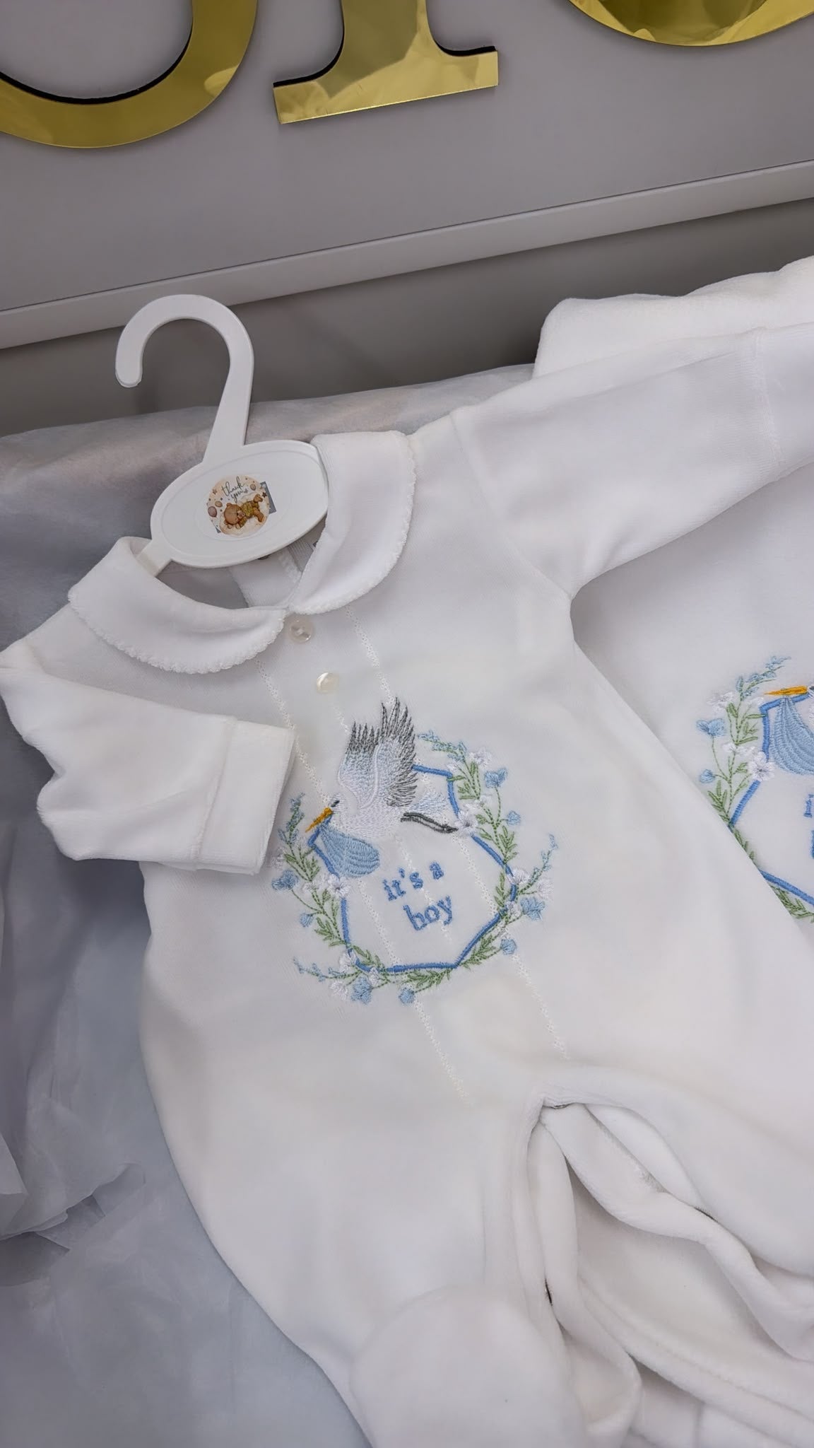 It’s a boy babygrow and blanket