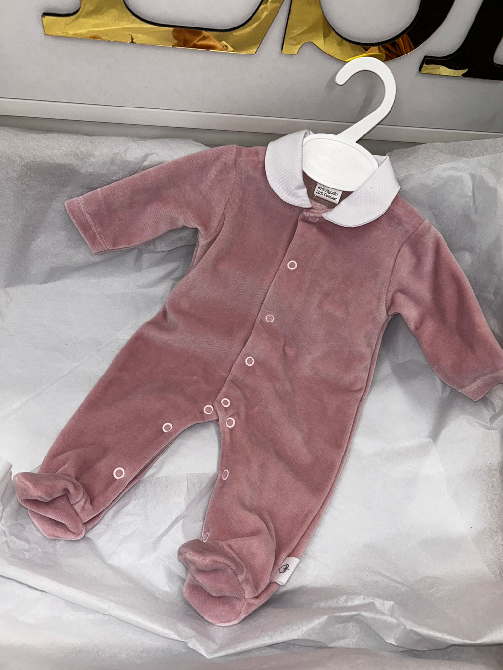 Pink velour babygrow