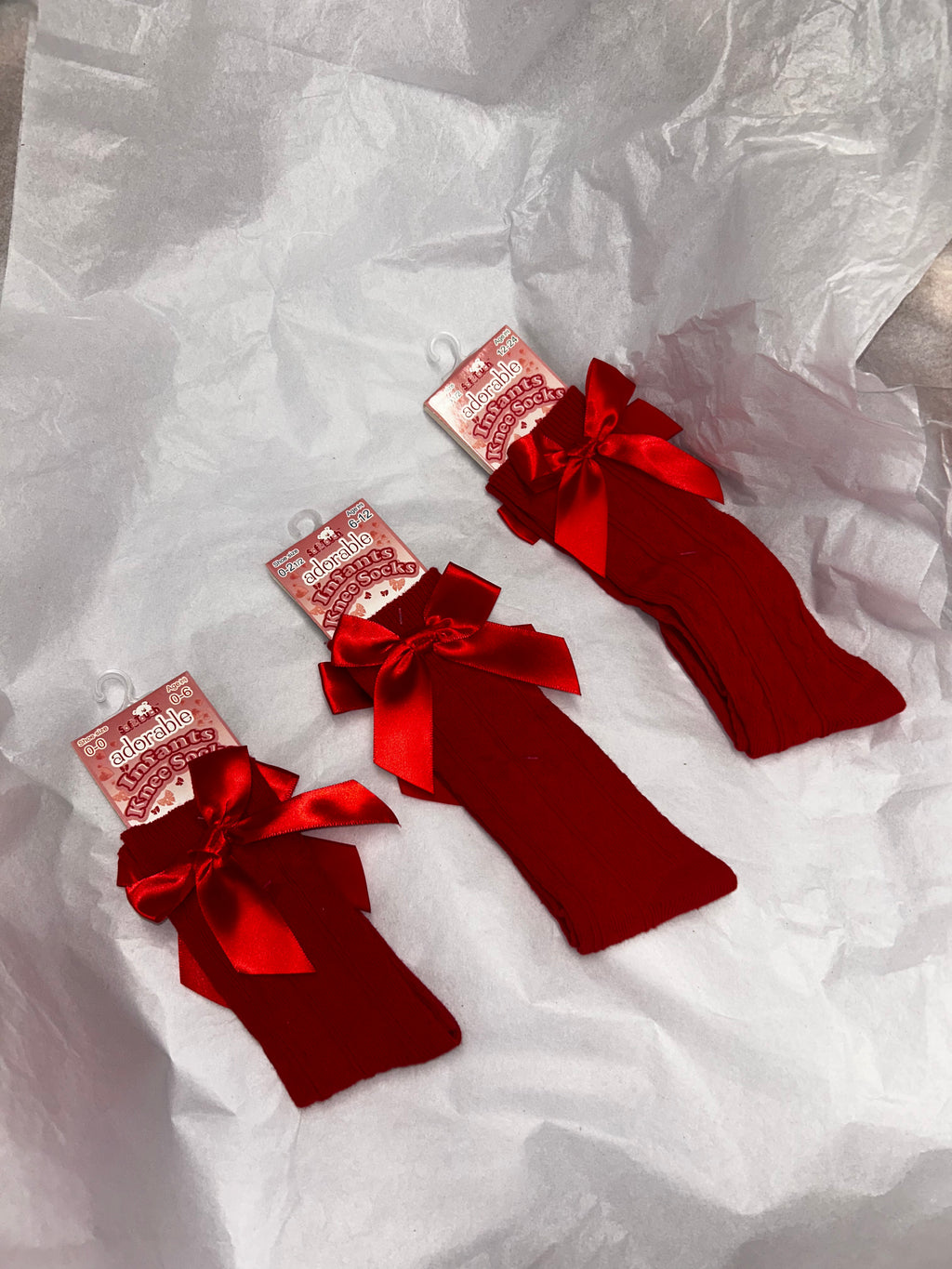 Knee high red socks with bow