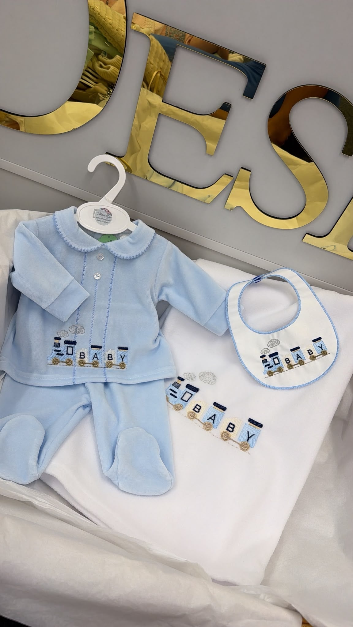 Baby train two piece outfit with matching bib and matching white fleece blanket