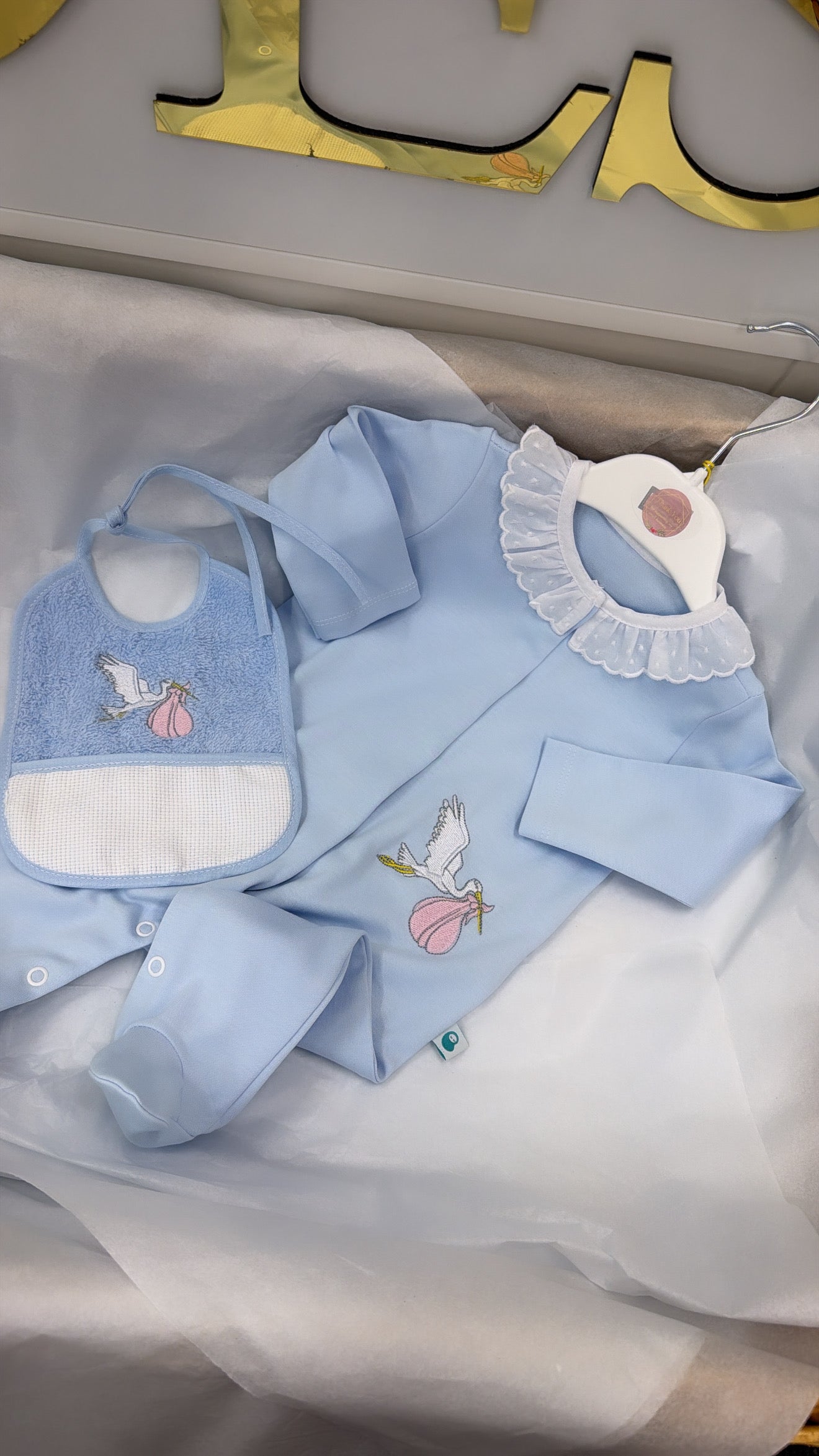 Stork babygrow & toweling bib