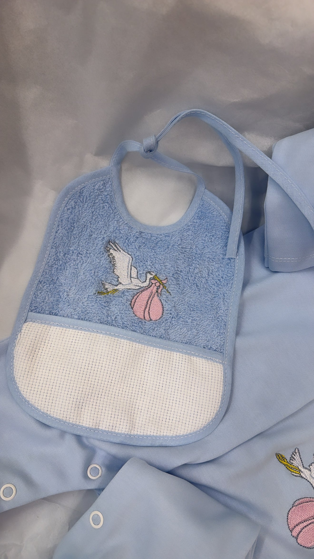 Stork babygrow & toweling bib