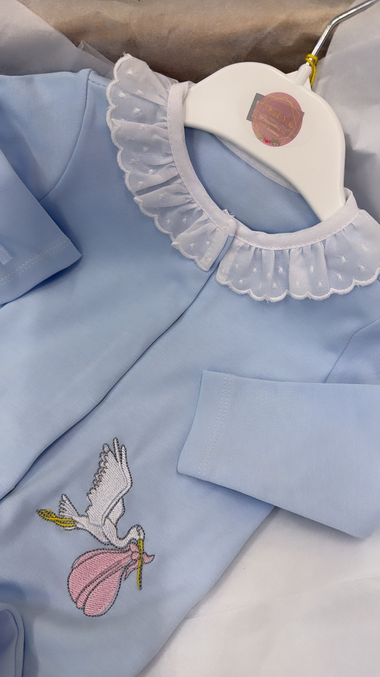 Stork babygrow & toweling bib