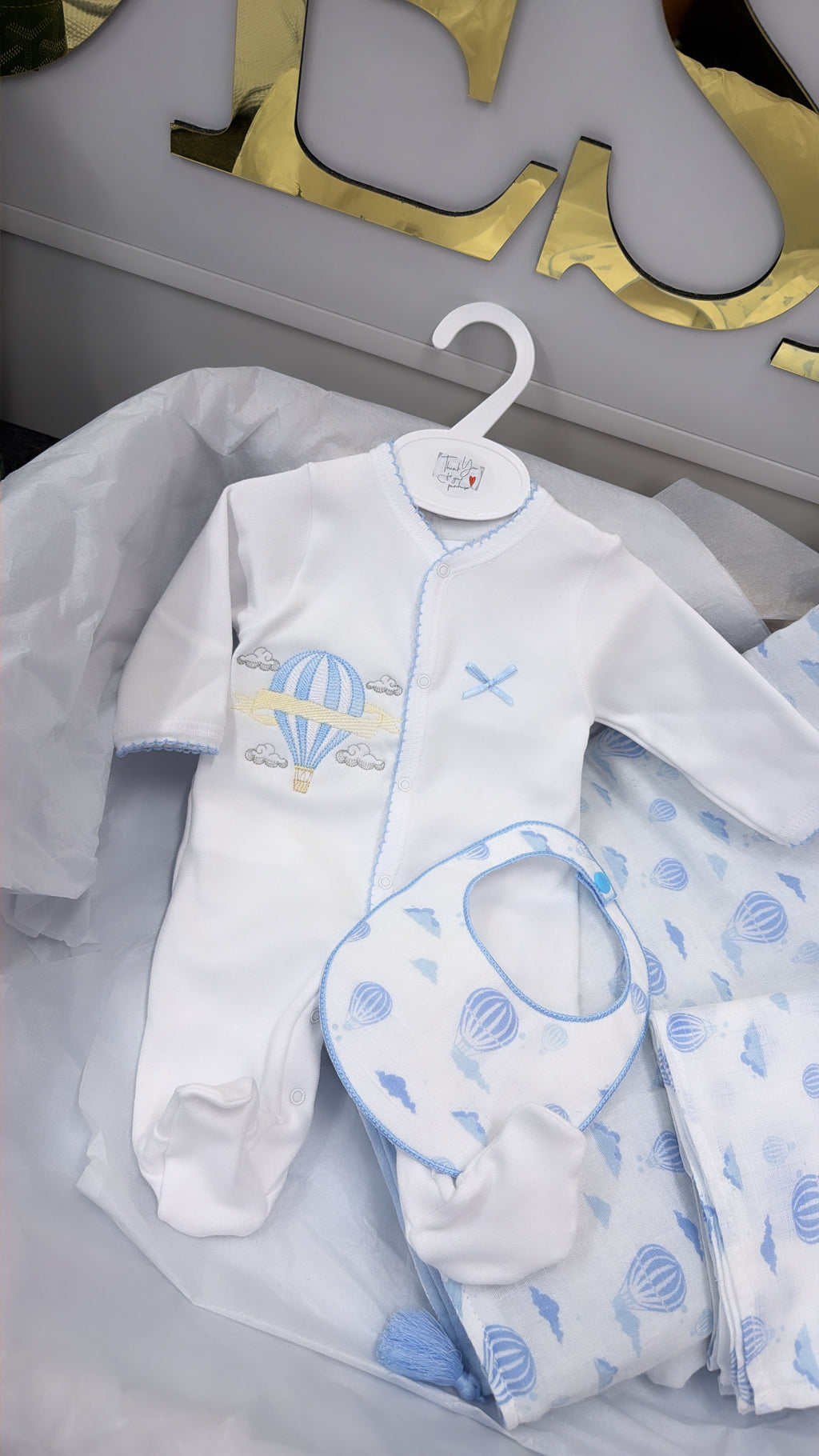 Blue trim hot air balloon full set: blanket babygrow and bib and muslin