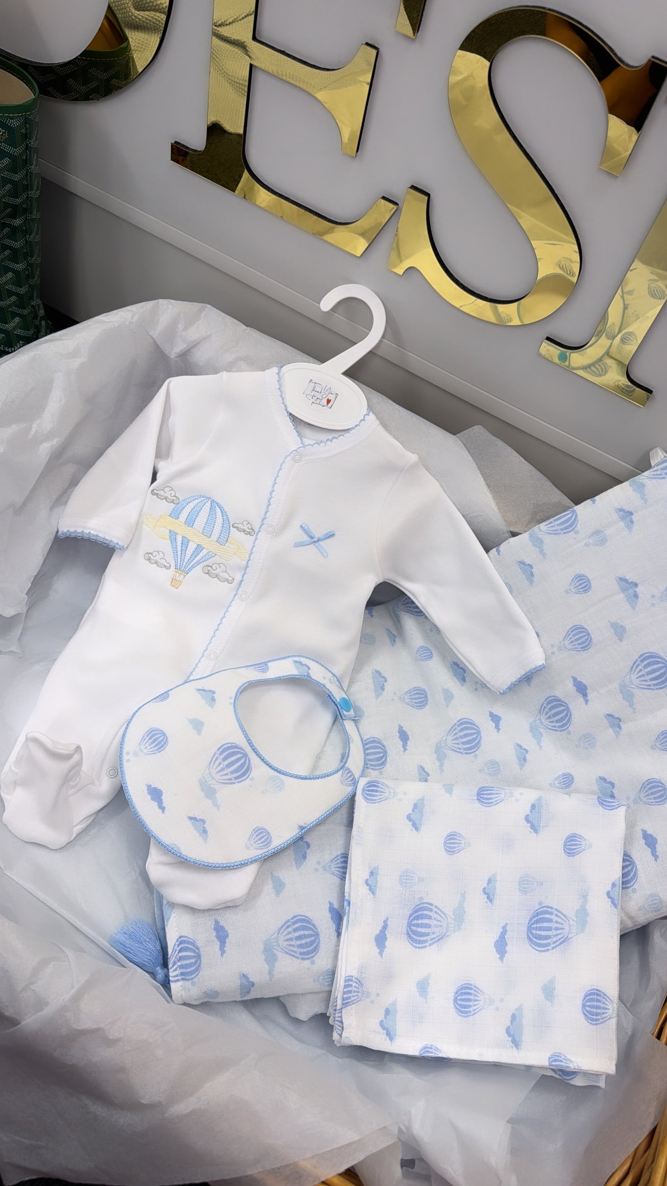 Blue trim hot air balloon full set: blanket babygrow and bib and muslin