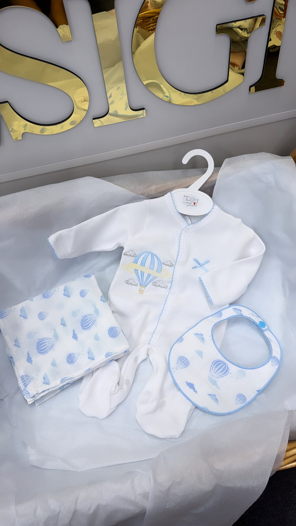 Blue trim hot air balloon babygrow,bib and muslin