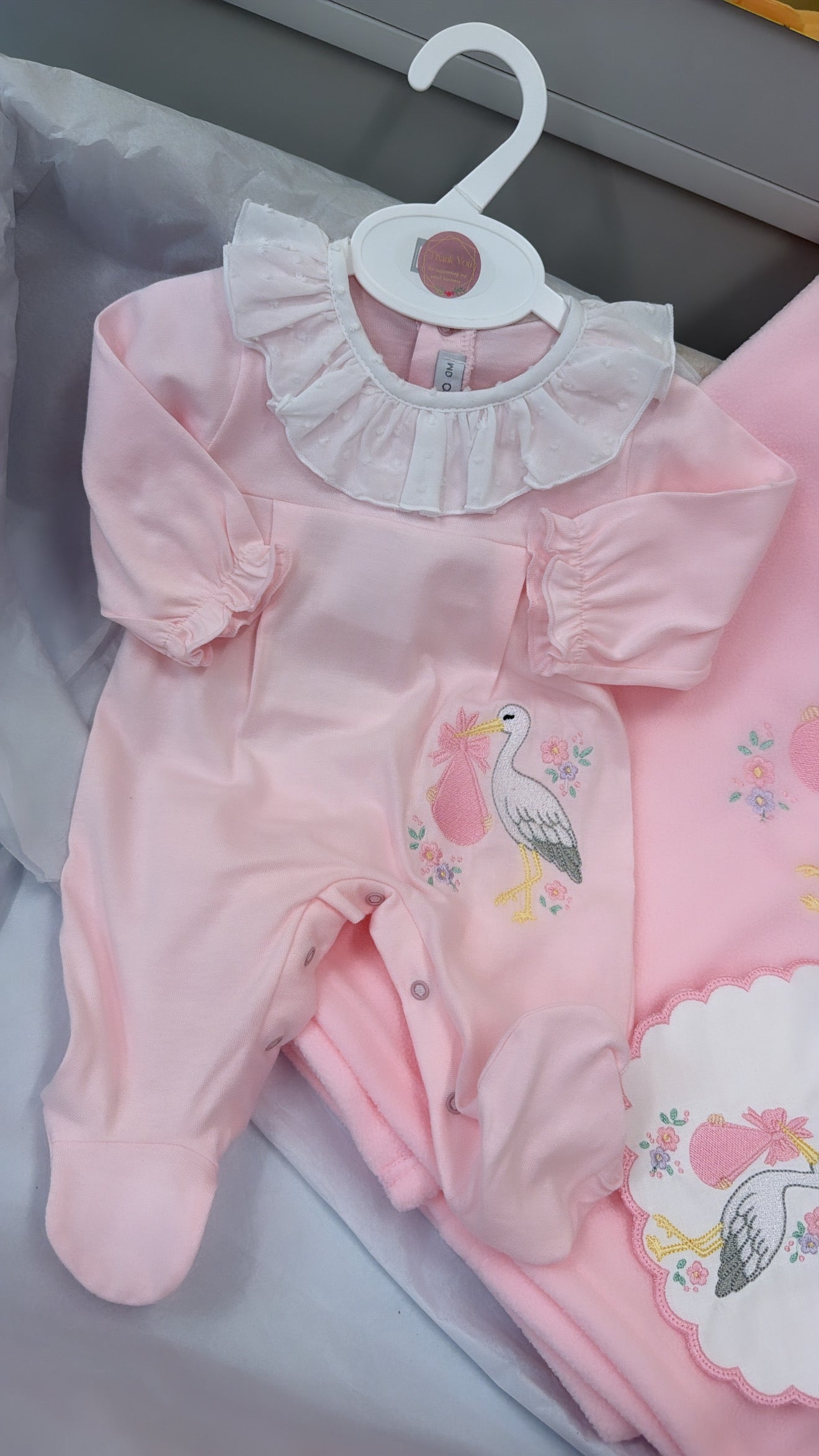 Pink stork babygrow & bib (blanket sold separately)