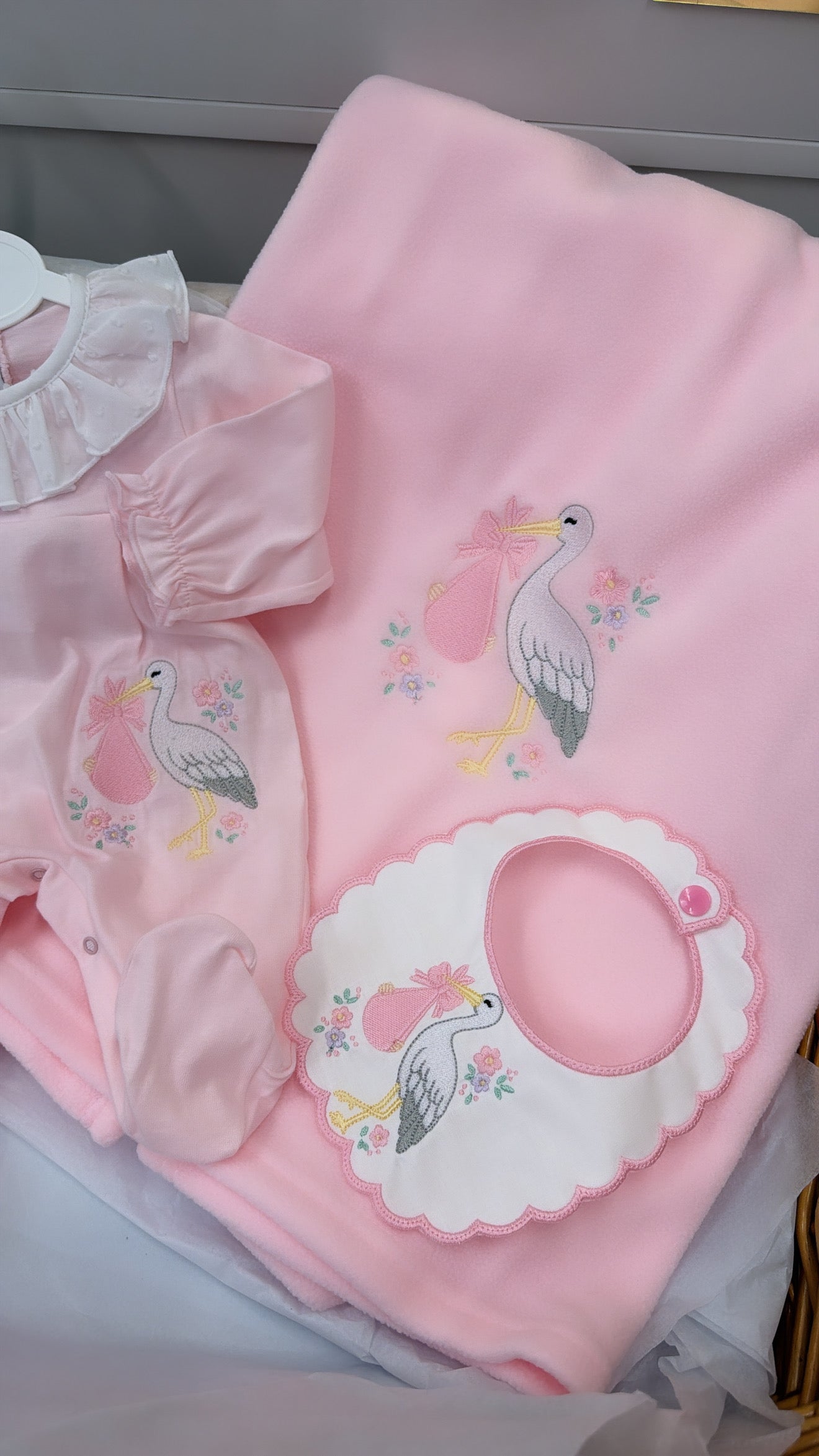 Pink stork babygrow & bib (blanket sold separately)