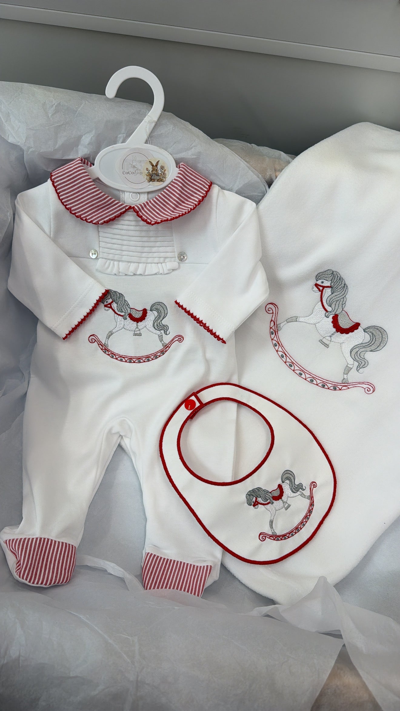 Red rocking horse babygrow&bib blanket sold separately
