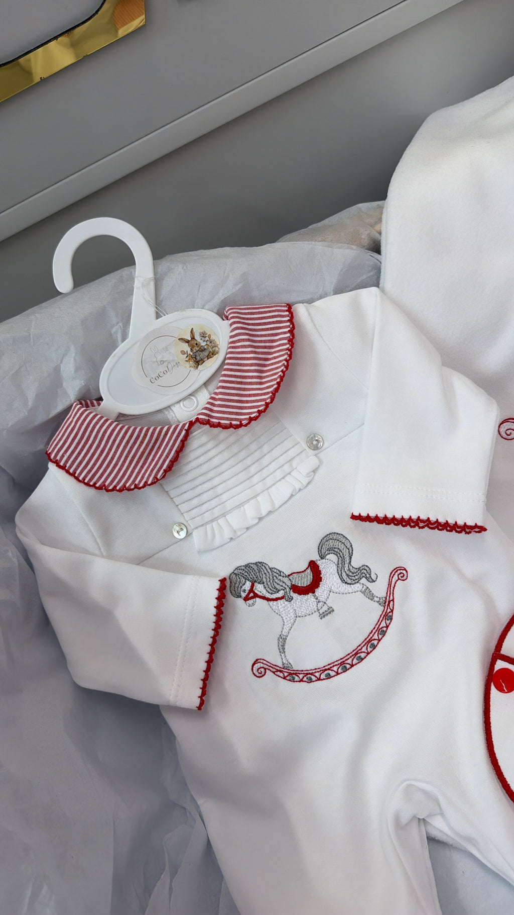 Red rocking horse babygrow&bib blanket sold separately