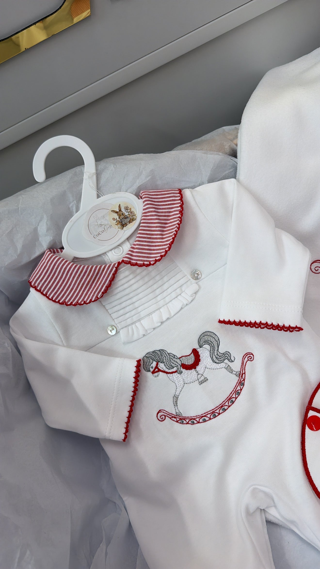 Red rocking horse babygrow&bib blanket sold separately