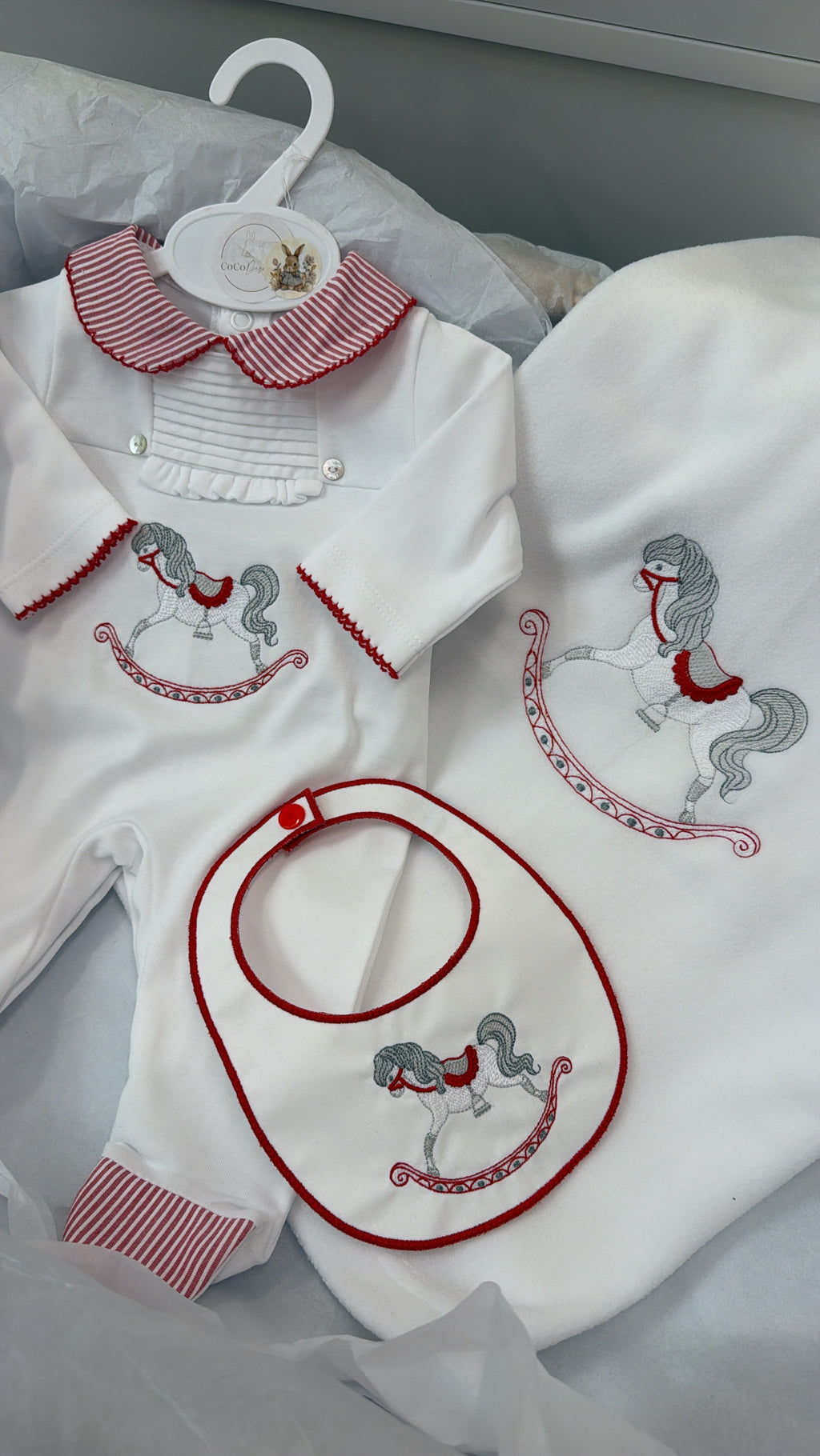 Red rocking horse babygrow&bib blanket sold separately