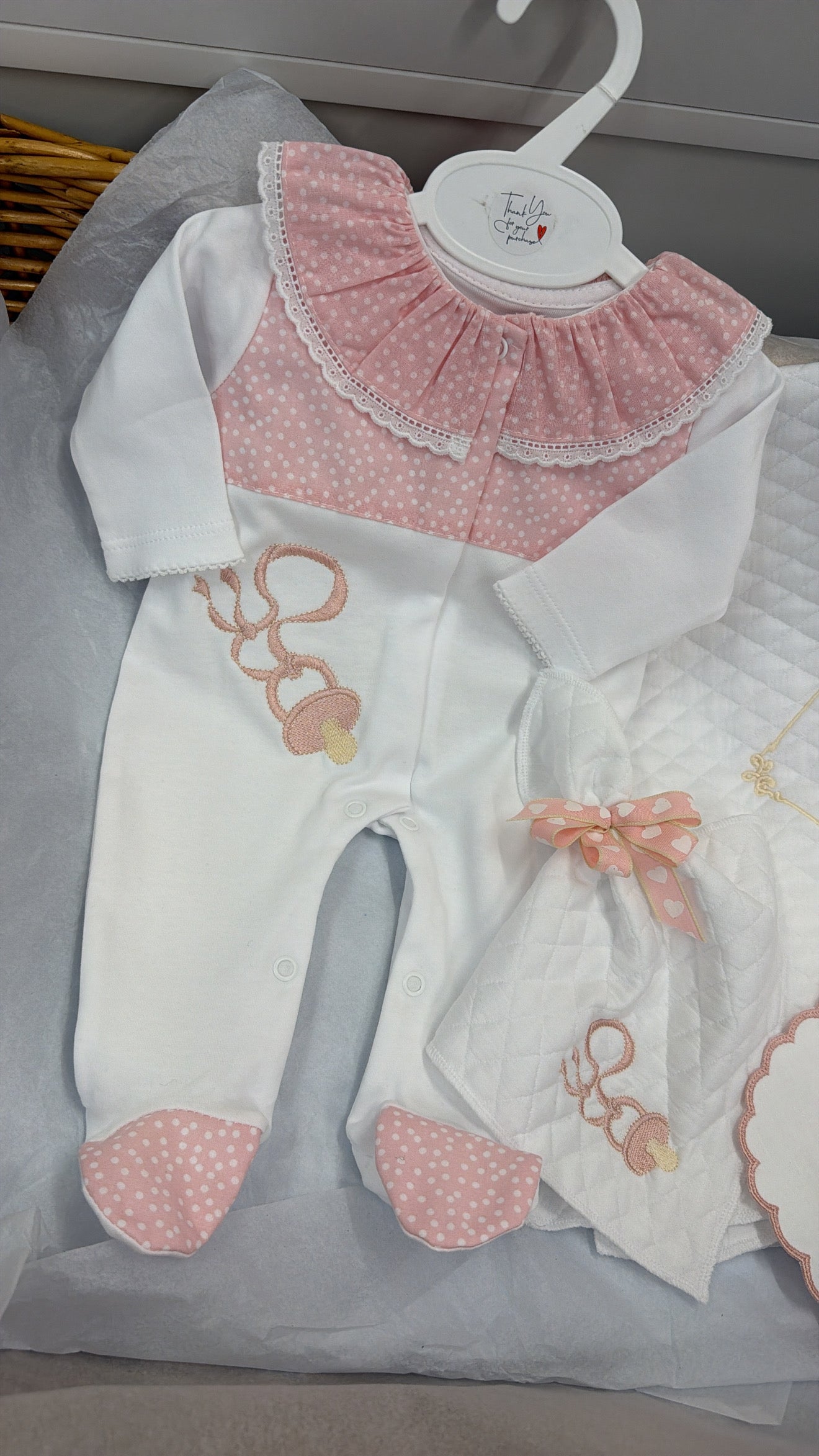 Pink Dummy four piece set: babygrow, bib, comforter and blanket