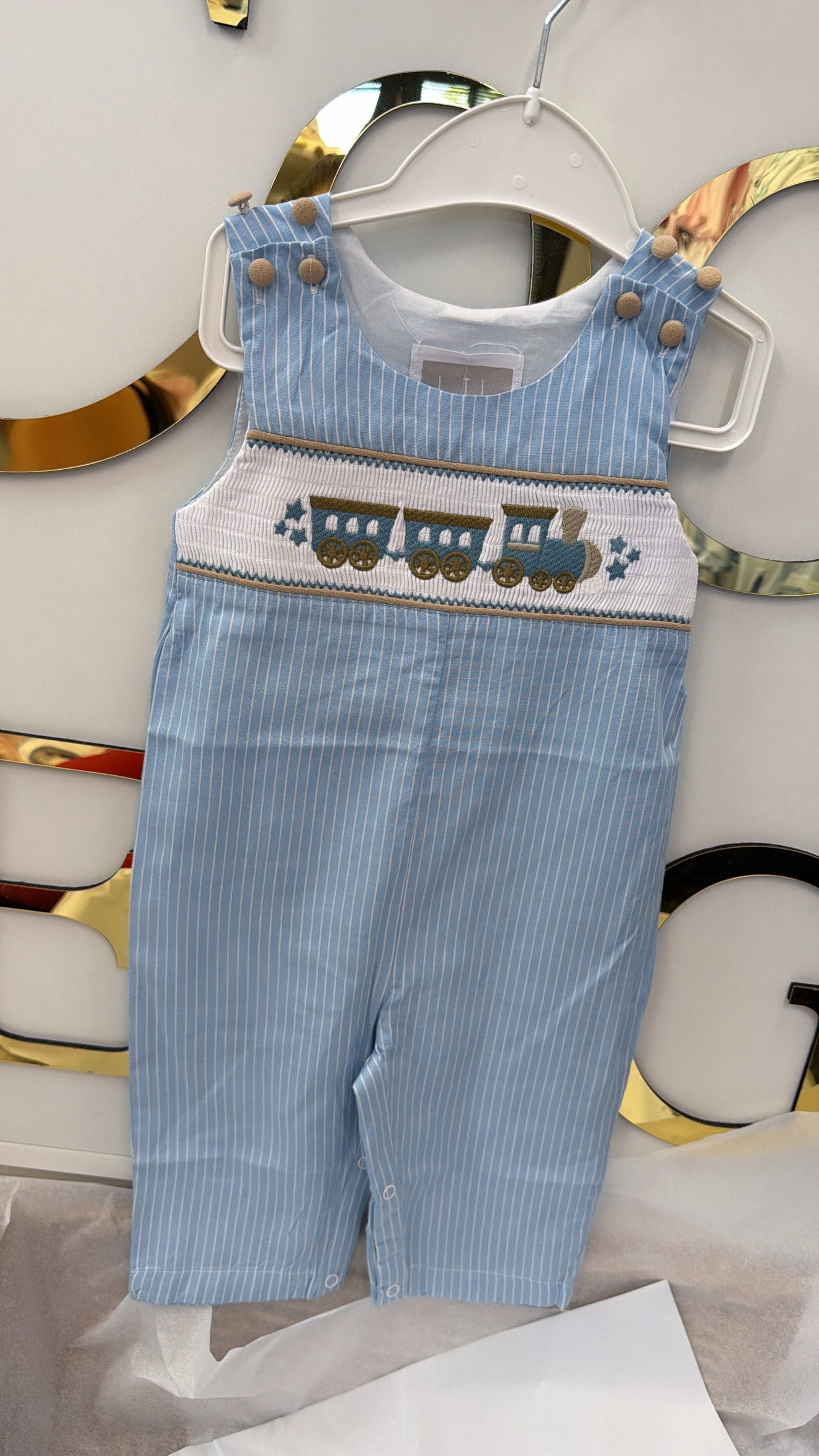 Smocked train dungarees